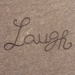 “Laugh” Wrought-Iron Wall Hang